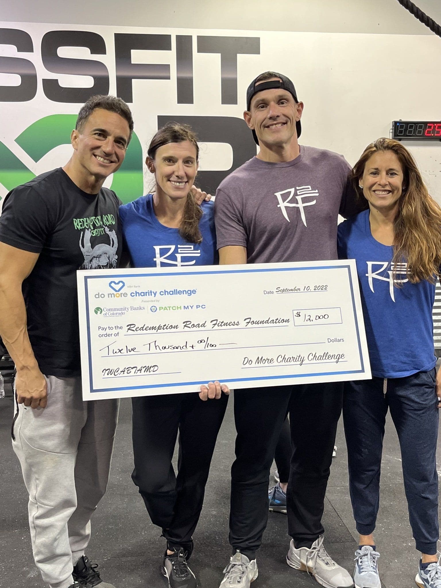 RF2 receiving a donation check